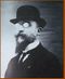 Erik Satie vers 1909 bureau-crate.jpg
